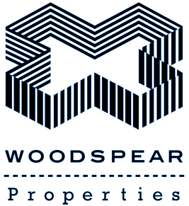 Woodspear Properties logo in the color blue