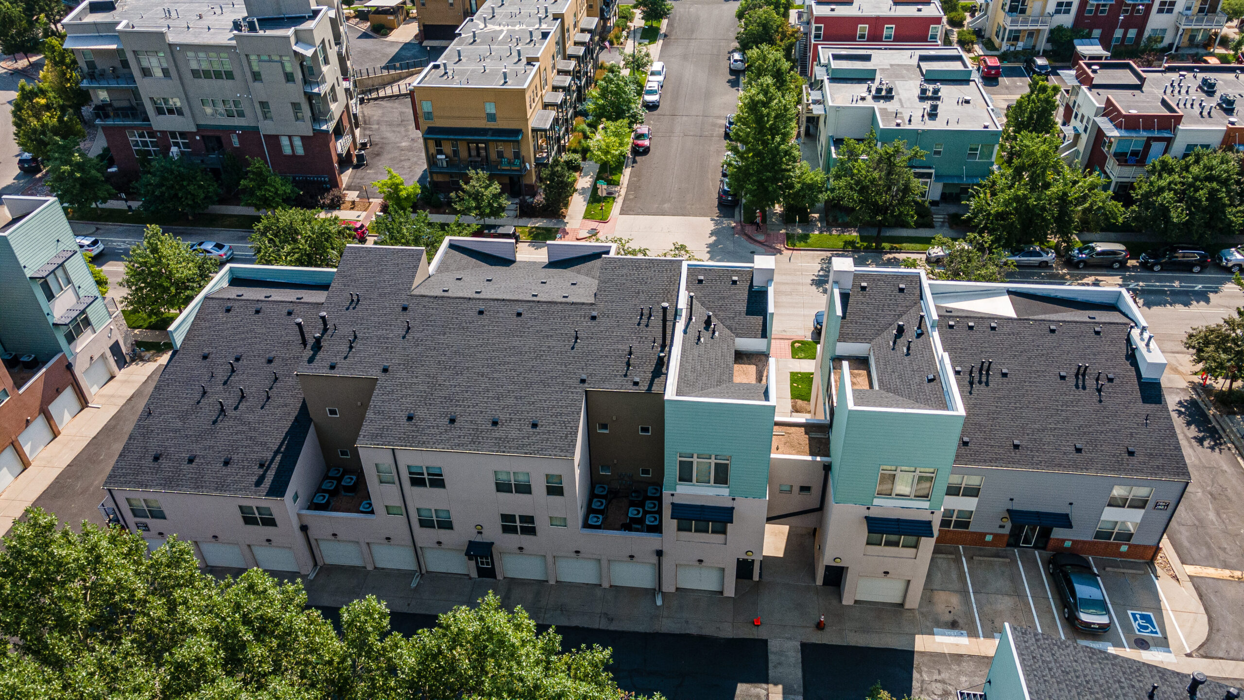 Overhead shot of apartment building with green accent walls