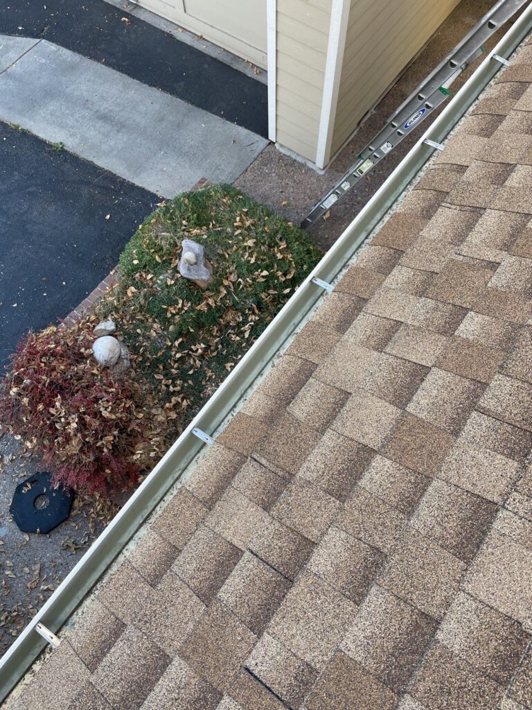 Gutter fully cleaned on exterior of house