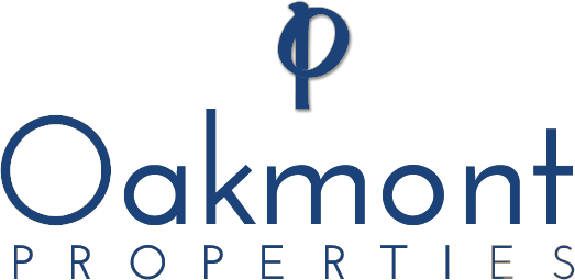 Oakmont Properties Logo in a navy blue color